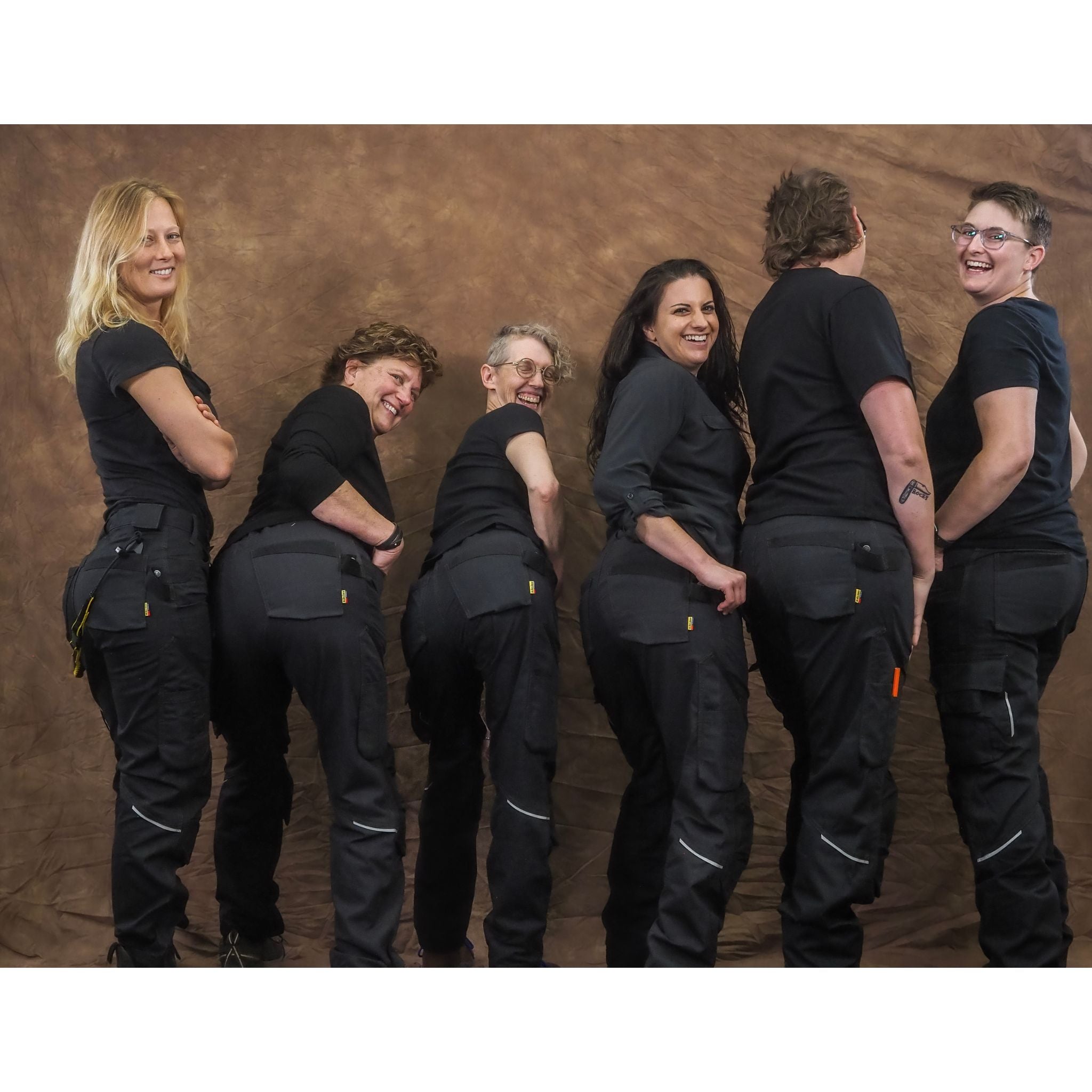Women's black workpants with eleven pockets group photo
