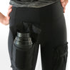 women's black work stretch pants with expanding pockets on thighs