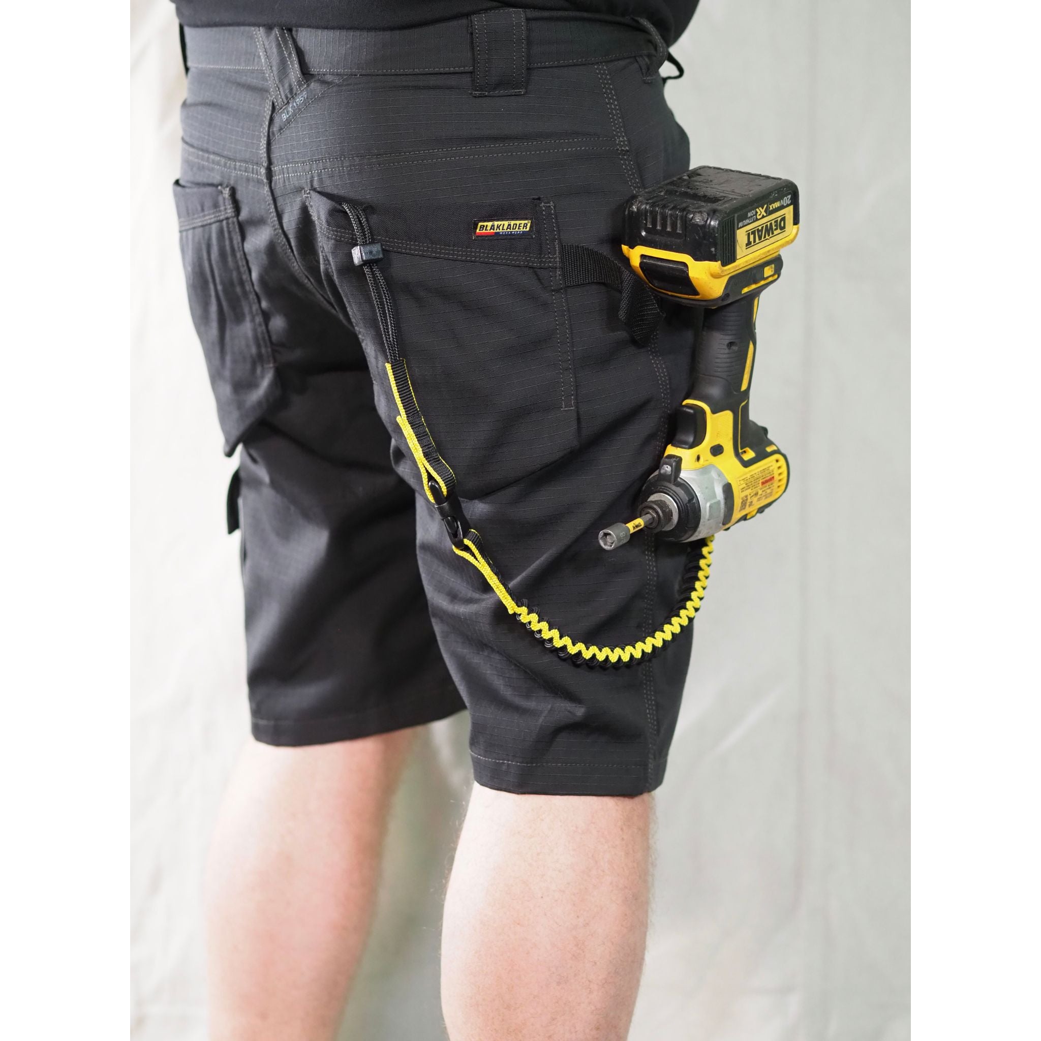 Men's black ripstop shorts with lanyard rear view