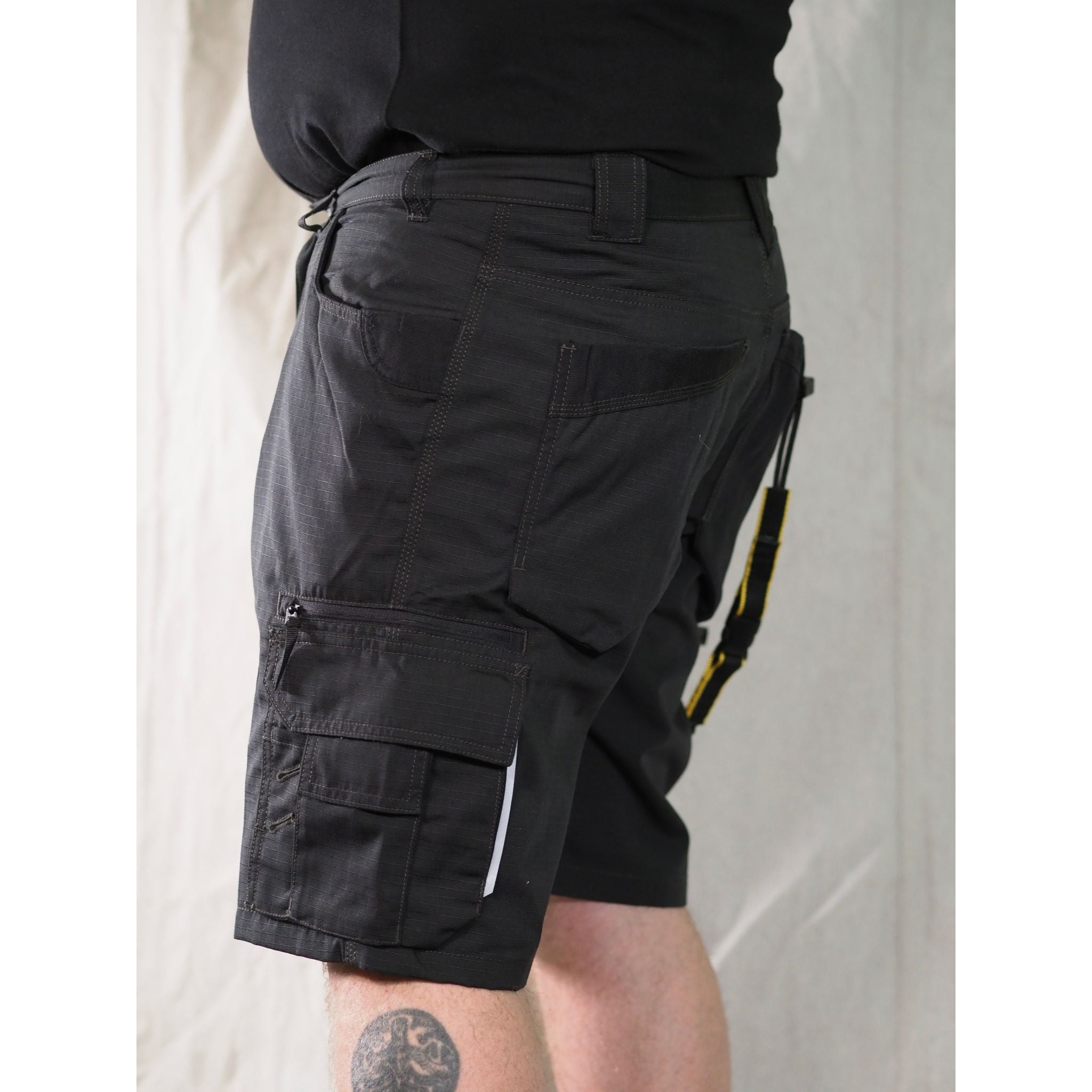 Men's stagehand black shorts with multiple leg pockets