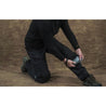 Removable kneepad pocket in black ripstop pants